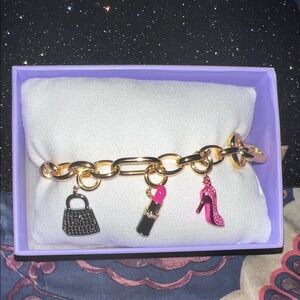 Gold Charm Bracelet with Pink Accents